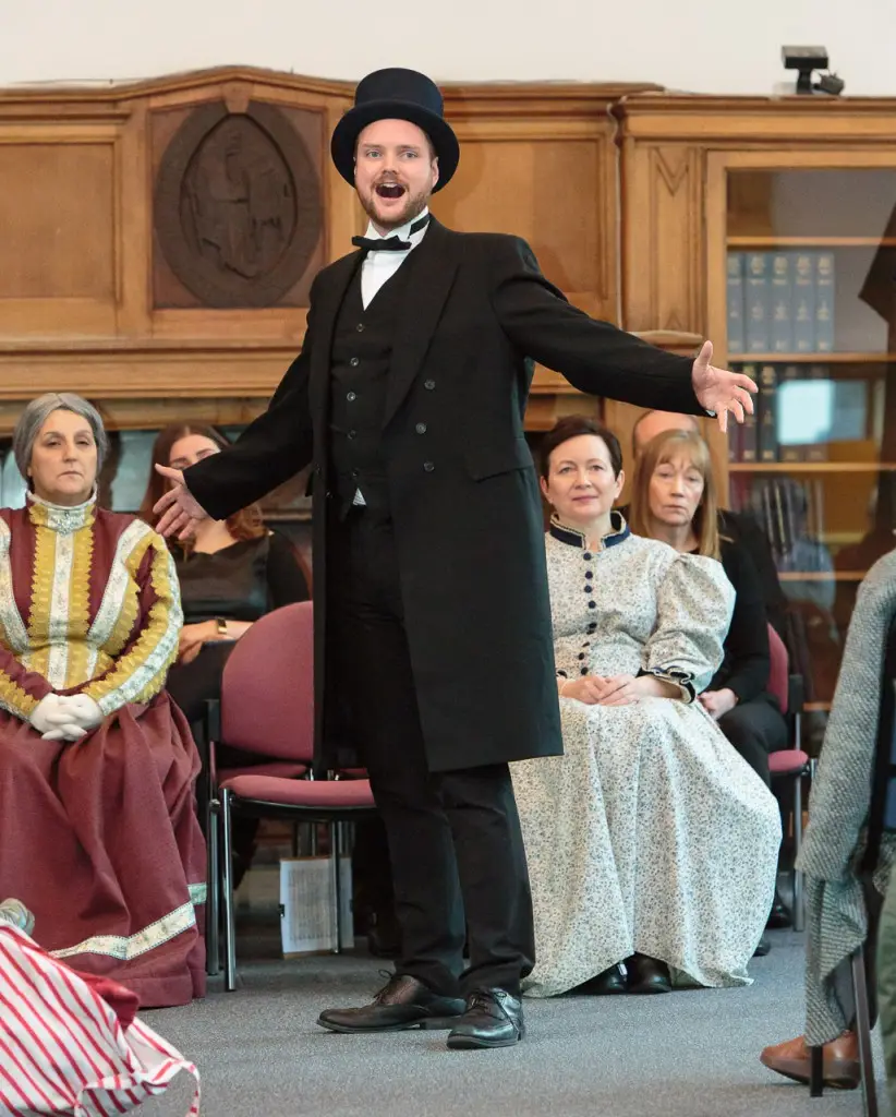 Andrew Carnegie’s great-great-great grandson Joe Whiteman (centre) sings one of the songs from Carnegie the Star Spangled Scotchman at the launch at the Dunfermline Carnegie Library & Galleries.